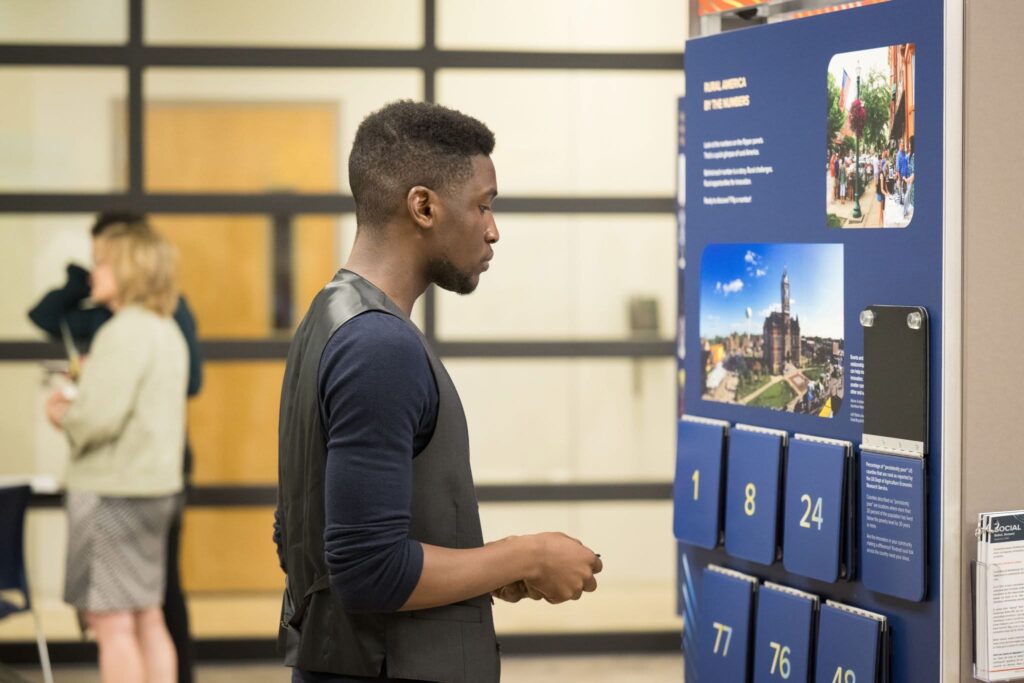 Spark! participant engaging with the exhibit.